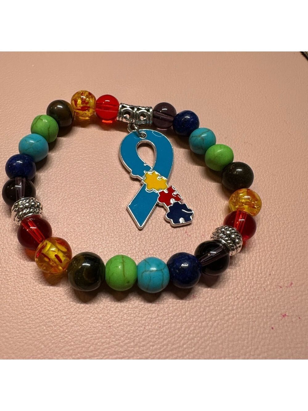 Autism Support Bracelet. Colorful Beaded Bracelet with Puzzle Ribbon Charm
